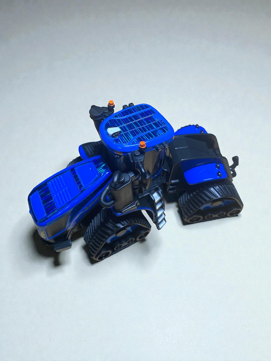 1/64 T9.700 SmartTrax II Prestige Tractor — Custom Blue Chrome Flake Wrap - Tractor Wrap Factory