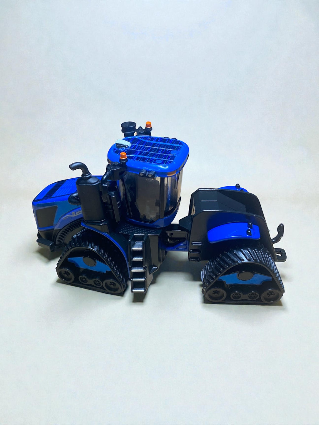 1/64 T9.700 SmartTrax II Prestige Tractor — Custom Blue Chrome Flake Wrap - Tractor Wrap Factory