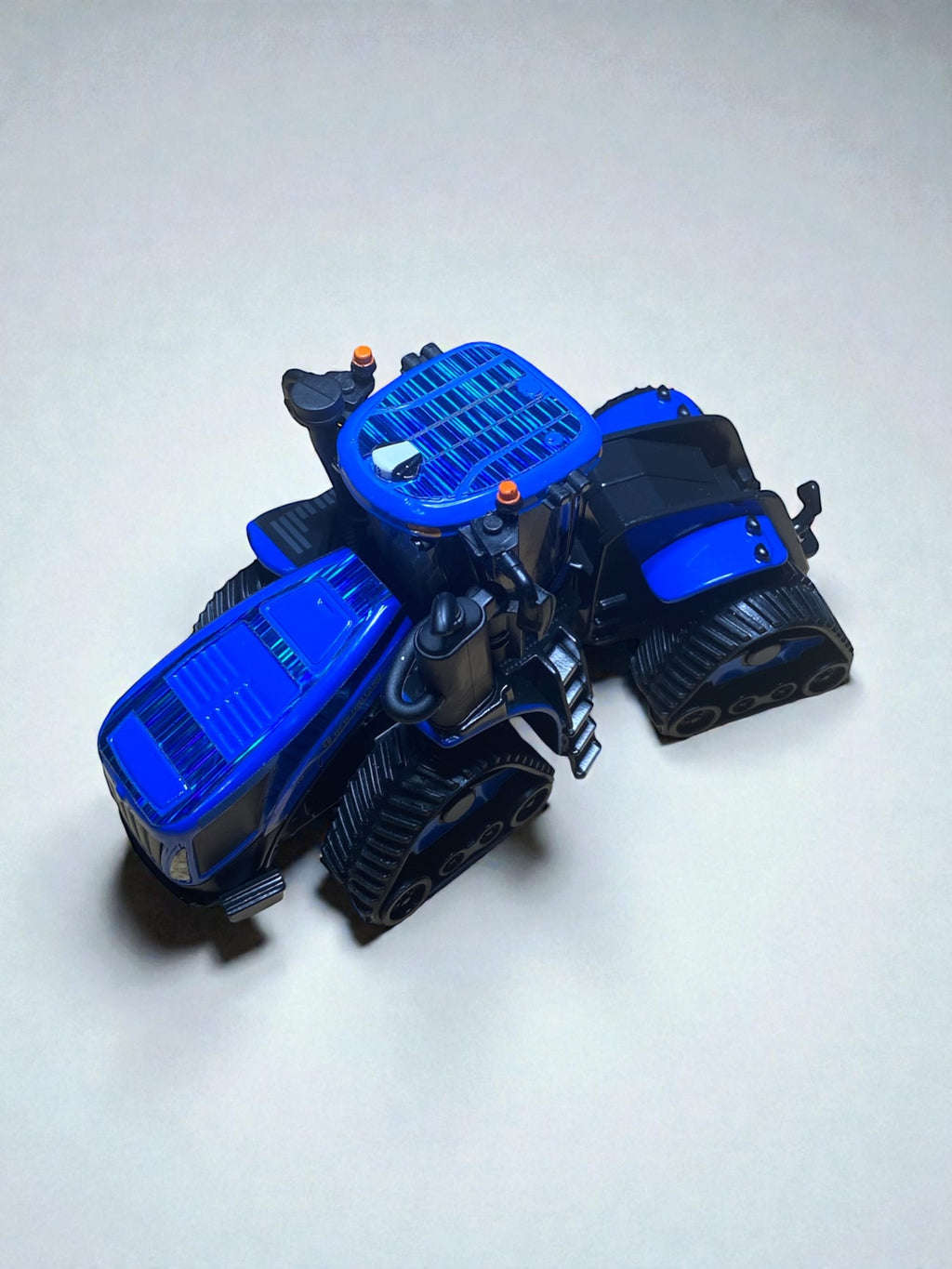 1/64 T9.700 SmartTrax II Prestige Tractor — Custom Blue Chrome Flake Wrap - Tractor Wrap Factory